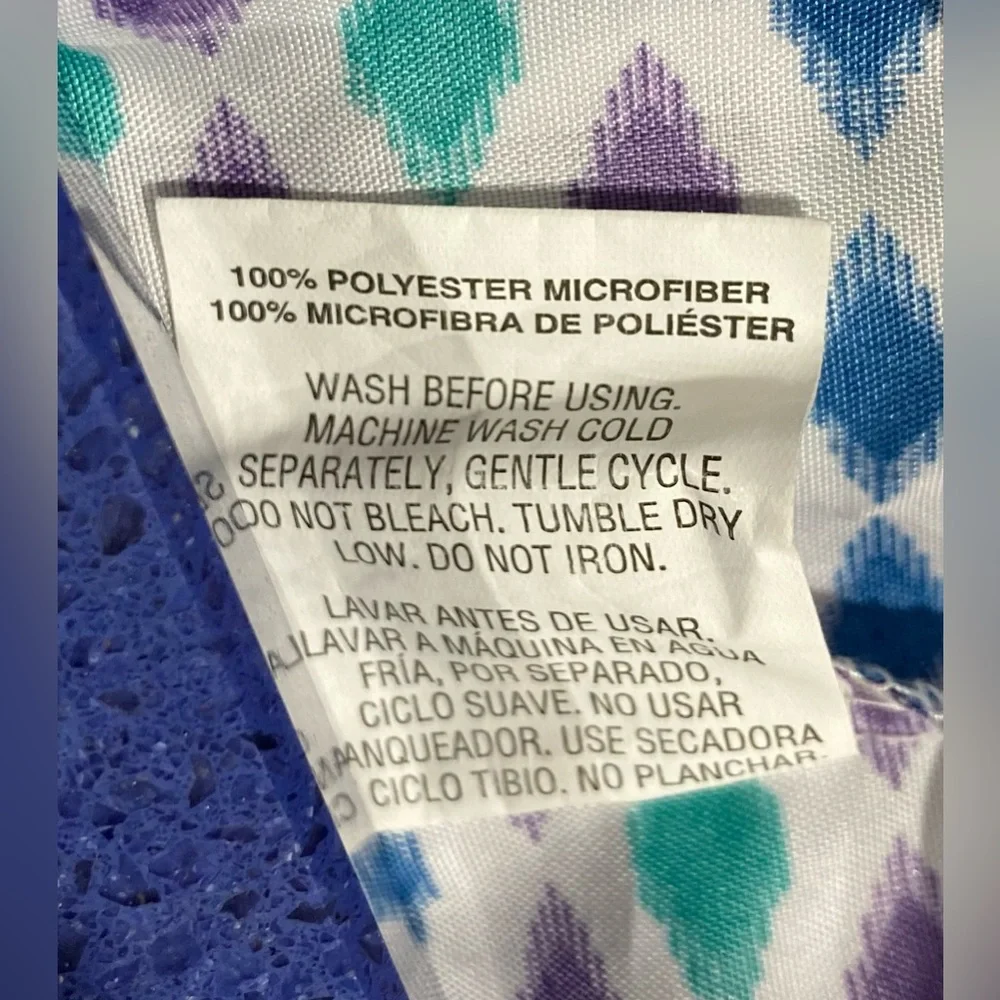 Twin sheet set in purple and teal diamond design